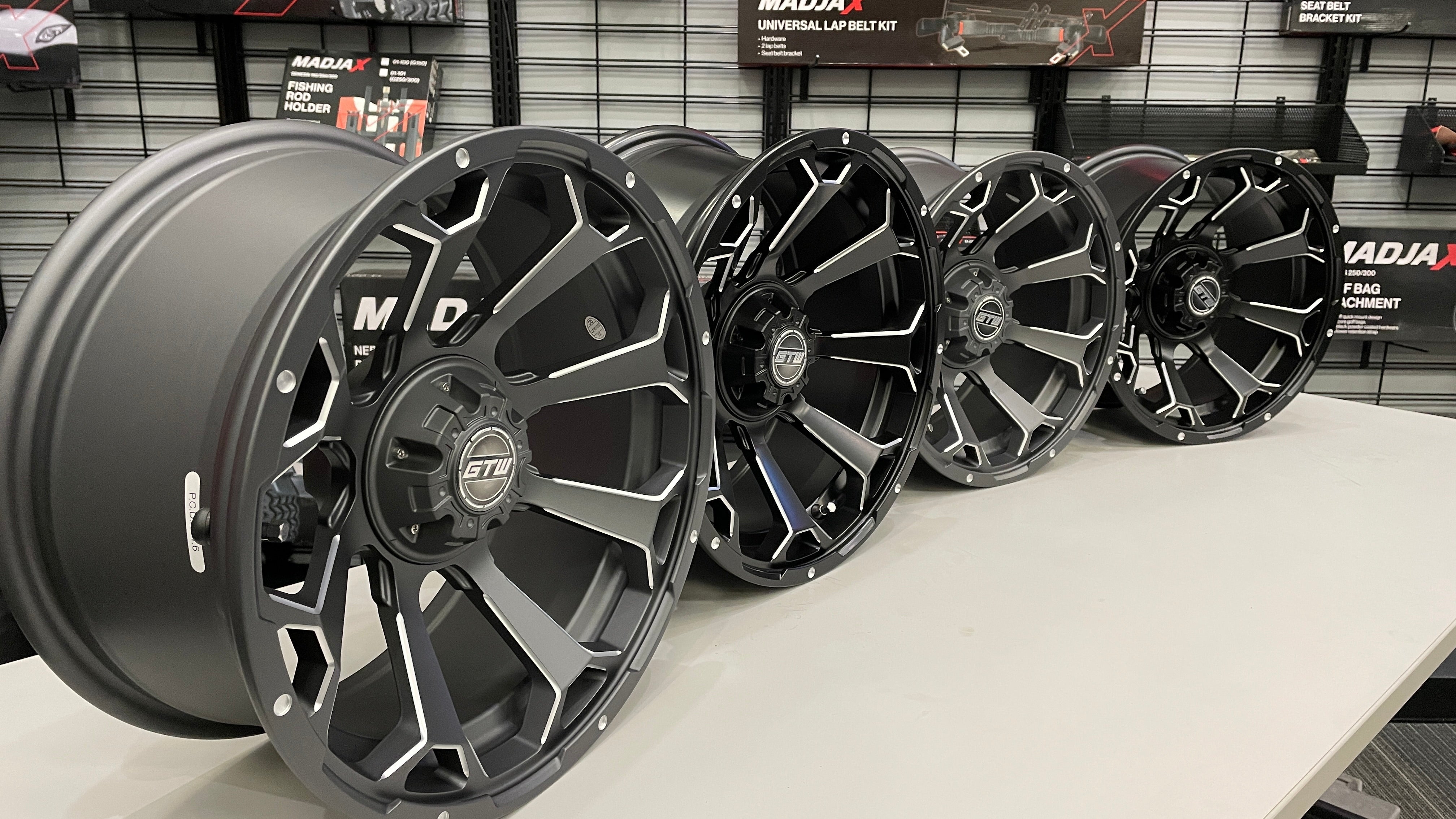 15-Inch GTW Raven Matte Gray Wheels with 23' GTW Nomad All-Terrain Tires (Set of 4)